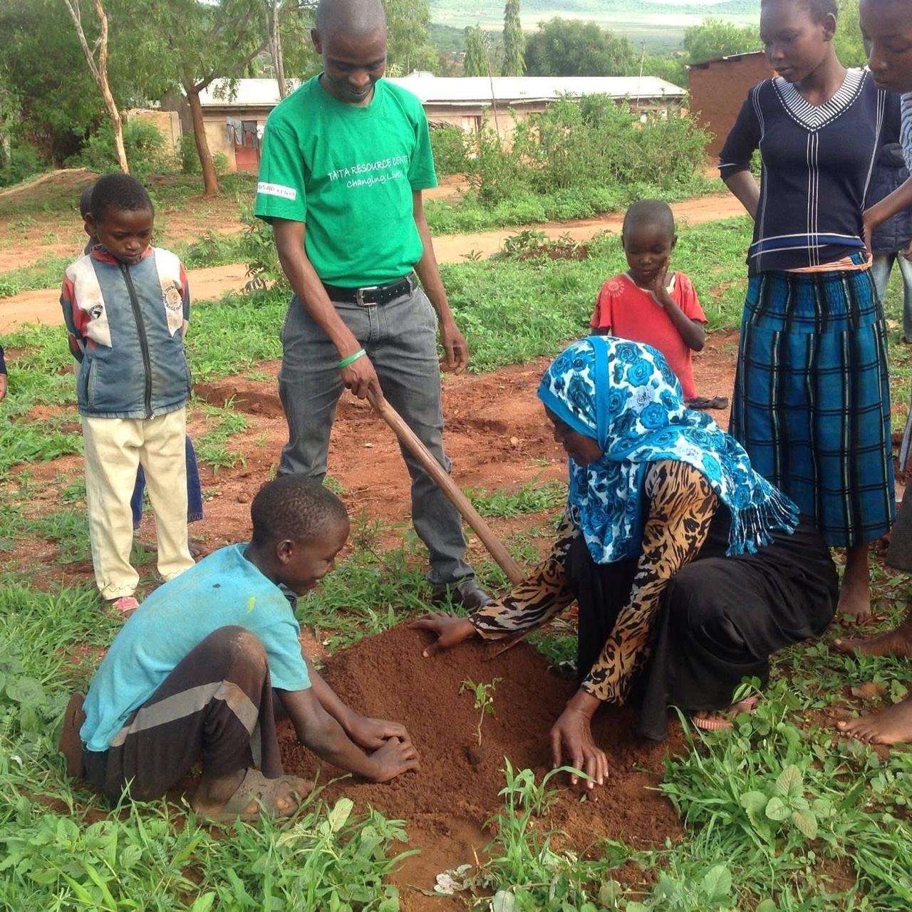 Tree planting ceremony with students